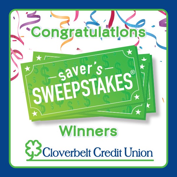 Ava K. Holding $1,000 Check for winning the quarterly saver's sweepstakes drawing.